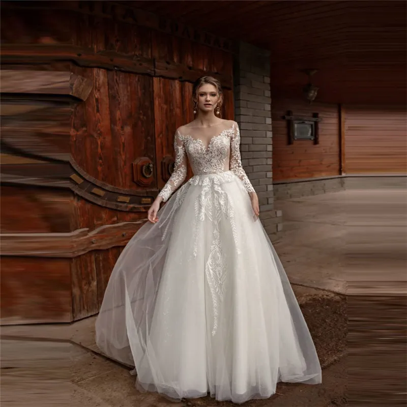 

Robe De Mariee Sheer Scoop Neck Long Sleeves Lace Appliques Wedding Dresses Buttons Lower Back Garden Ladies Bridal Party Gowns