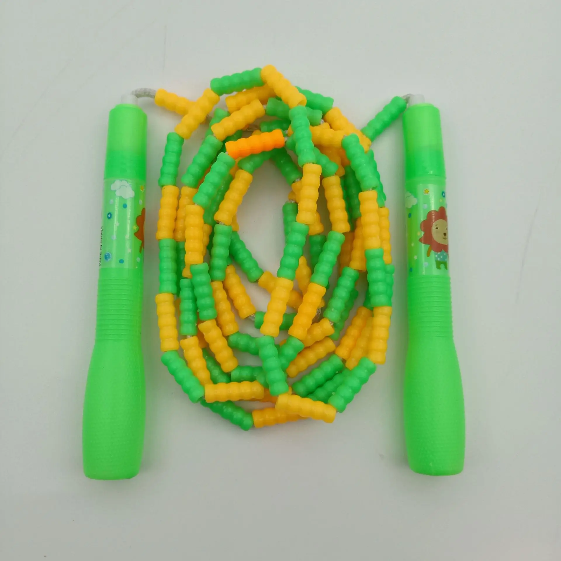 

Liang Jian Manufacturers Direct Selling Children Figure Bamboo Joint Jump Rope Cartoon Plastic Handle Peanut Beads Hundred Secti