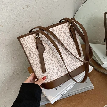 

Retro ladies small bag 2020 new trendy fashion wild casual portable bucket bag net red one-shoulder armpit bag