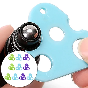 

10pcs Triangle Shaped Essential Oil Opener Plastic Oil Corkscrew Key Tools for Roller Bottle Caps Random Color