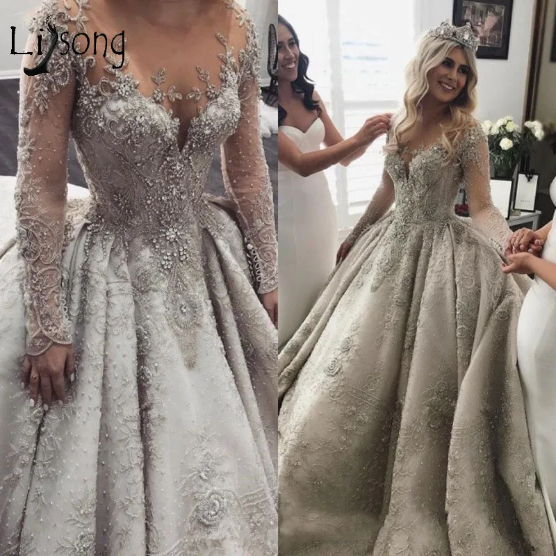 Luxe Crystal Kralen Wedding Jurken Met Volledige Mouwen 3D Kant Applicaties Bruidsjurken Dubai Sparkle Bridal Jurken Luxe Crystal Kralen Wedding Jurken Met Volledige Mouwen 3D Kant Applicaties Bruidsjurken Dubai Sparkle Bridal Jurken