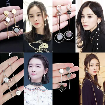 

Korean temperament geometry s925 silver color needle triangle shell female long asymmetric personality super fairy earrings