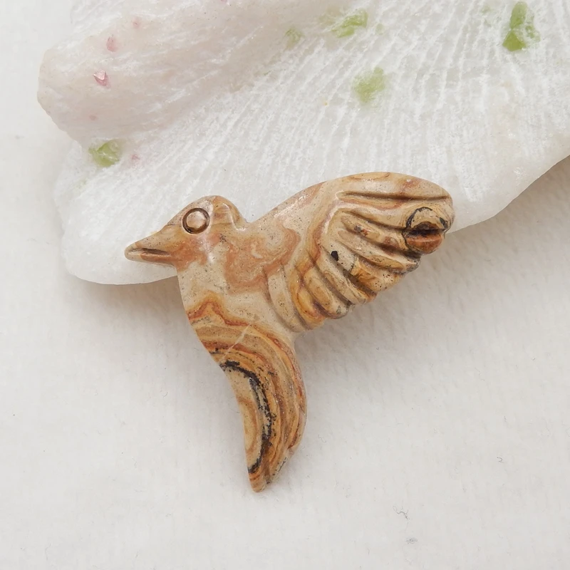 

Natural stone Carved Jasper Pendant,38x34x7mm8g