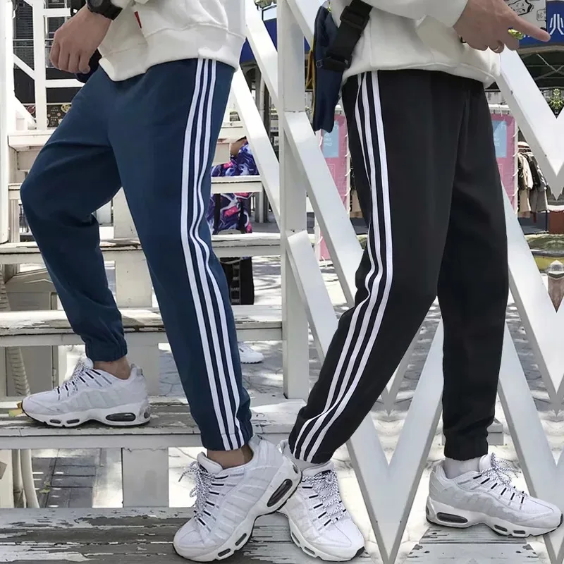 

INS Super Fire Handsome nan shi ku Casual Korean-style Three-Bar Harem Men And Women Couples Versatile Students Trend Capri Pant