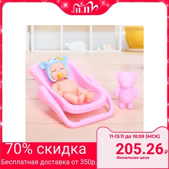 

Baby doll "My baby" in carrying, with an accessory