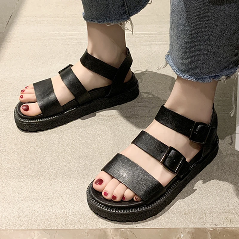 black flat platform sandals