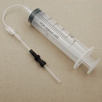 

Road Bike Tubeless Tyre Oil Sealant Injector Tool MTB Bicycle Tire Filling 60ml