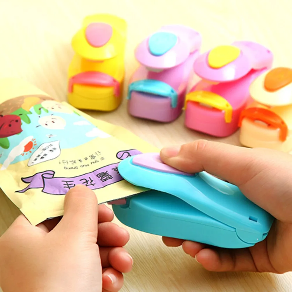 

2017 Useful Blue Mini Portable ABS Handheld Heat Sealing Machine Plastic Bag Sealer Seal Tool Store Stylish Kitchen Tools