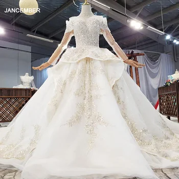 شراءفستان زفاف فاخر من الكريستال مطرز بالخرز موديل HTL1851 2020 بأكمام طويلة قبالة الكتف بأربطة من الخلف