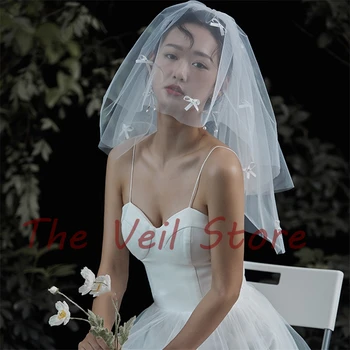 

Short Ivory Bridal Wedding Veils Bows 2T Pearls Accessories for bride with Comb Velo de Novia Voile de Mariee mariage Courte