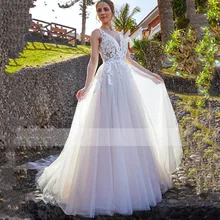Bohemian A Line V Neck Wedding Dress 2021 New Sleeveless Backless Illusion Tulle Lace Applique Sweep Train For Female Bride Gown
