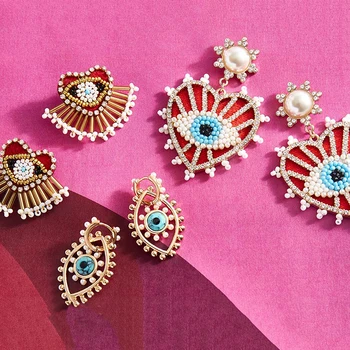 

Dvacaman Bohemian Handmade Eyes Beads Red Heart Drop Earrings for Women 2020 Summer Earrings Jewelry Fashion Statement Earrings