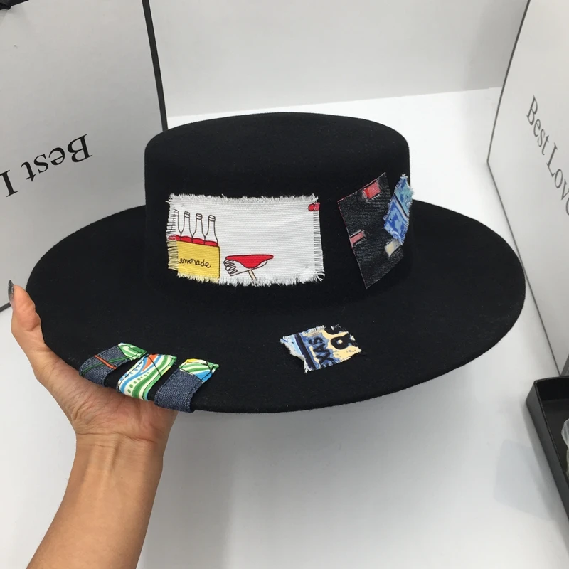 

New winter fedoras wool that Europe and the United States designer duds flat brim hat for women fashion ins wind patch