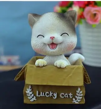 

cute cat shaking his head in creative cute pet simulation car accessories home furnishings craft access wholesale factory outle