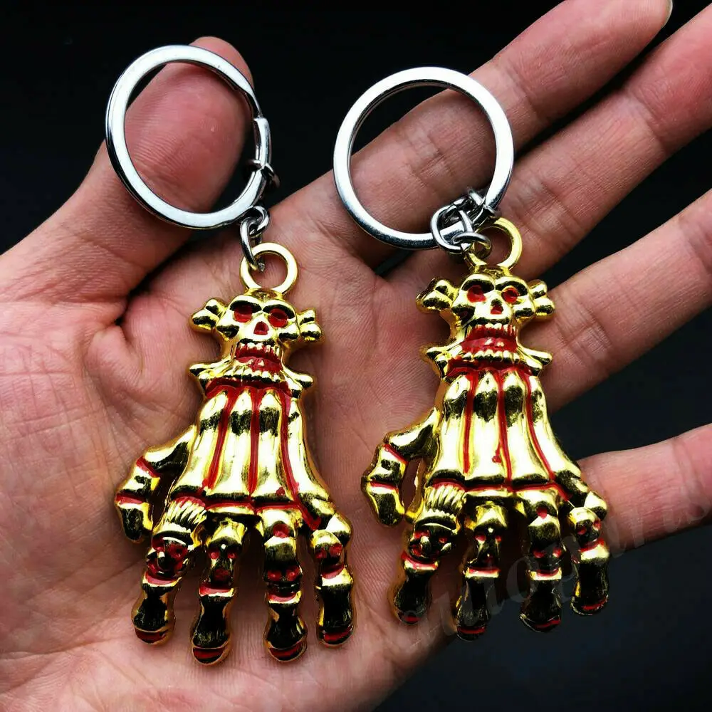 

2pcs Metal Golden Skull Evil Head Hand Keyring Keychain Key Chain Ring