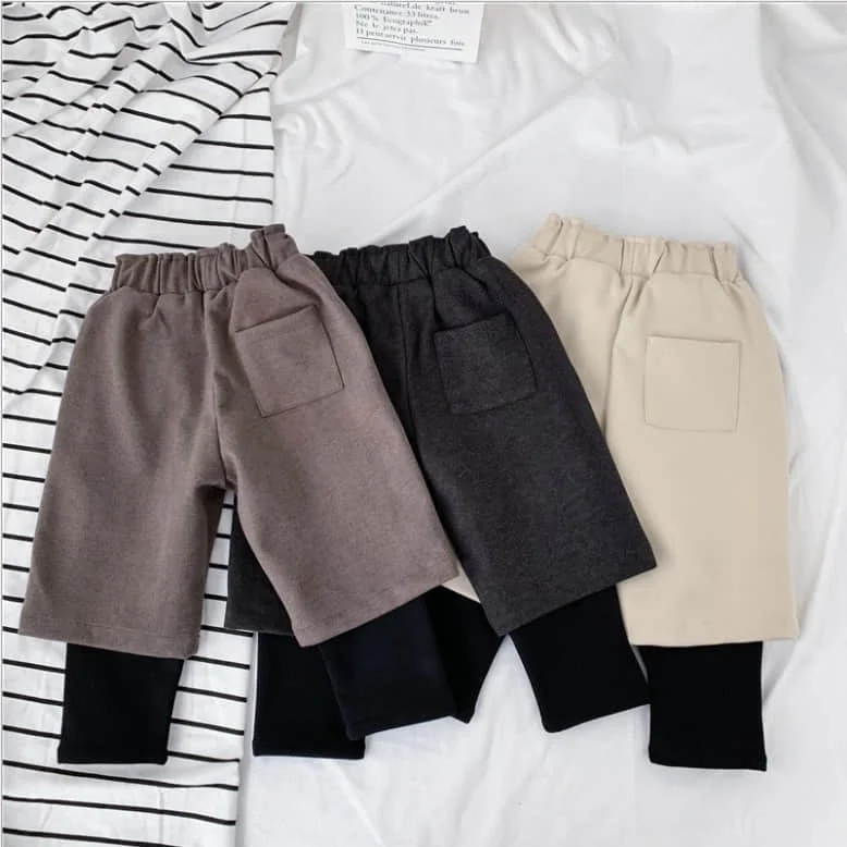 

Winter baby pants new girls fake two-piece plus velvet thick woolen pants Korean version of the wild casual pants trend