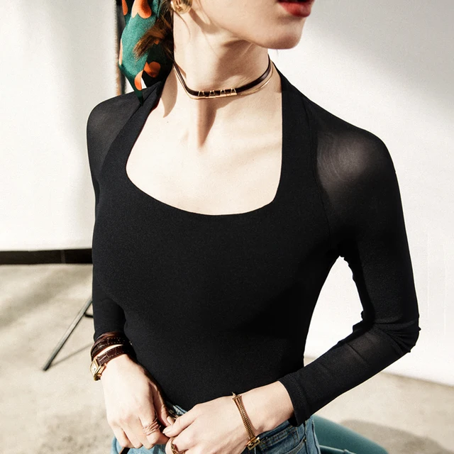 여성을 위한 세련된 빈티지 매력: 솔리드 스트레치 블랙 메쉬 티셔츠
