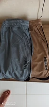 Pantalones cortos de culturismo para hombre, pantalones cortos masculinos de estilo veraniego para ejercicio de gimnasio, ropa deportiva de secado rápido de malla transpirable apta para correr