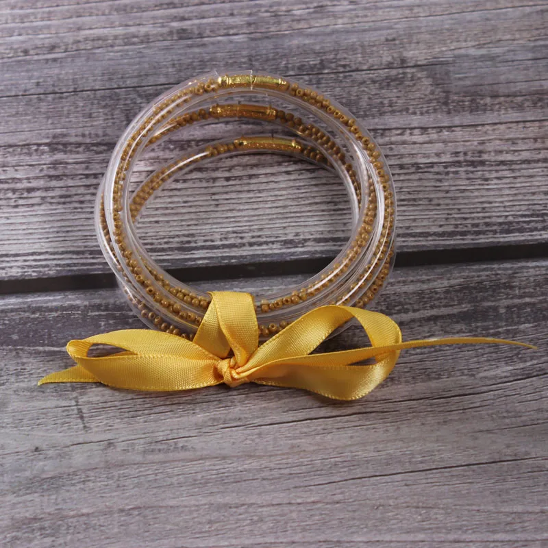 

5 PCS/Set Bowknot Gold Silver Seed Beads Bangles Set 2019 All Weather Stack Silicone Plastic Colorful Jelly Bangles Wholesale