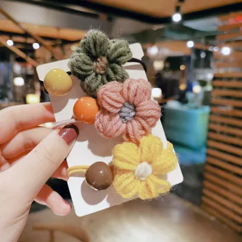 

Korean Spring New Baby Girl Wool Flower Net Red Ins Hair Rope Simple Sweet Little Garden Ball Hair Circle Head Rope