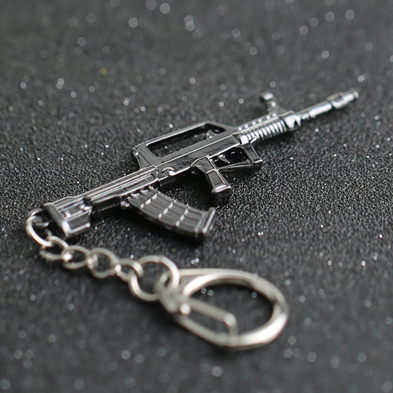CS GO CSGO CF брелок FAMAS 95 АВТОМАТИЧЕСКАЯ винтовка пистолет оружие счетчик удар крест огонь брелок кольцо ювелирные изделия