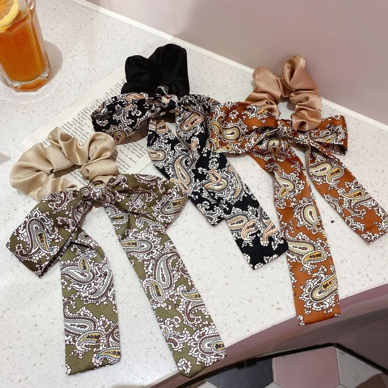 

Korea bow tie hair tie satin ribbon hair rope French retro net red tie hair ring head jewelry women