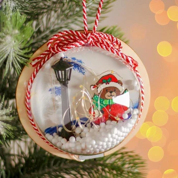 

Christmas ball with a wooden figure and illumination "Teddy bear and a lantern" 12x12 cm