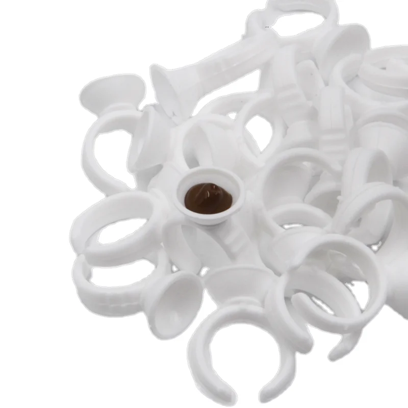 Anello di inchiostro per tatuaggio bianco in plastica da 100 pezzi