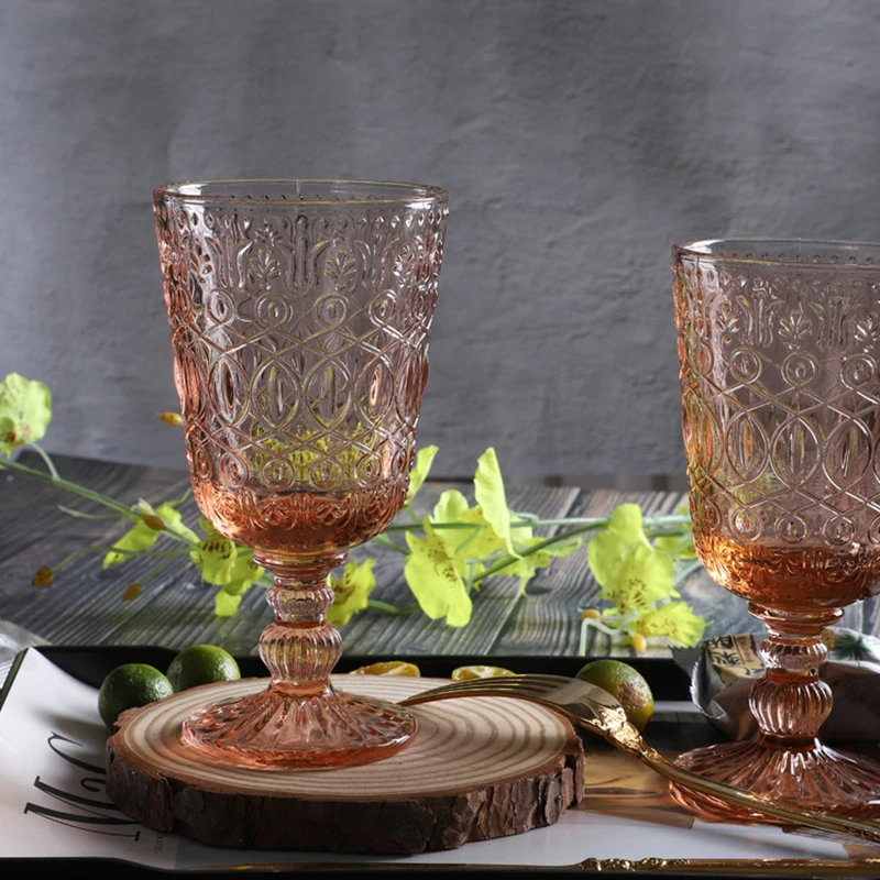 https://ae01.alicdn.com/kf/H294dd57009f54eabb5dfeef5b81bb0cf4/Red-Wine-Glass-Set-of-2-350-ml-Orange-Pink-Goblet-Retro-Embossed-Juice-Drinking-Cup.jpg