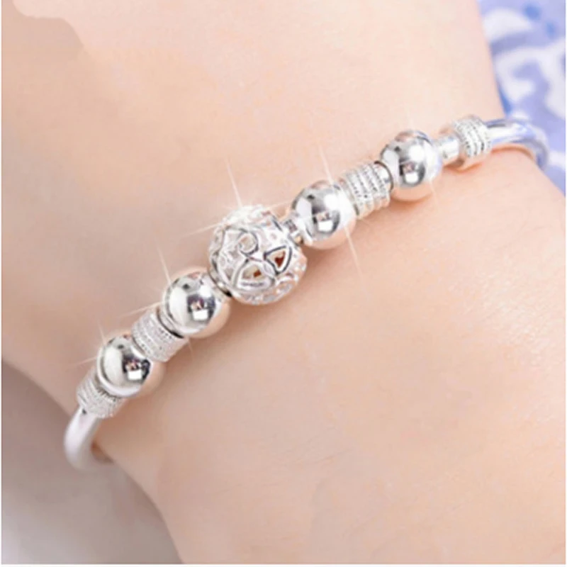 

Nine turn white copper silver plated bead bracelet bracelet female models transfer beads bracelet exquisite ball ornaments
