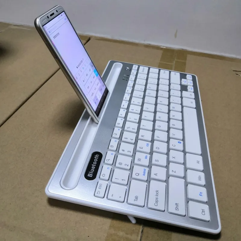 Двухканальная Bluetooth клавиатура с держателем телефона перезаряжаемая