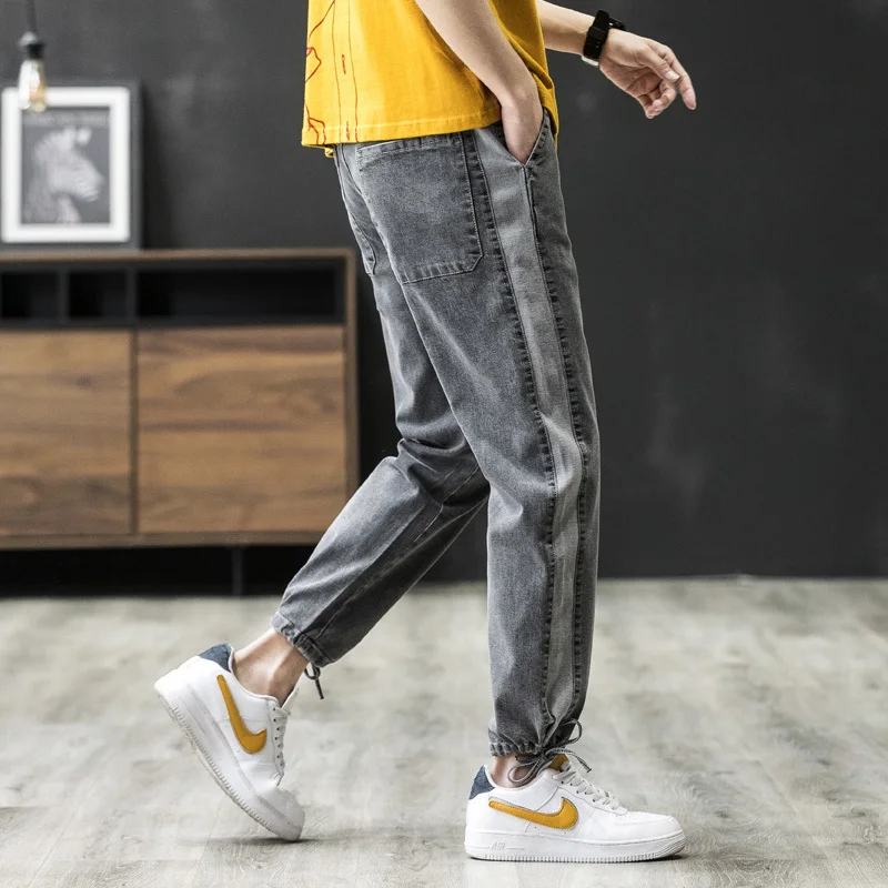 

Spring jeans men's loose Korean version of the trend of light-colored Harem feet men's casual tooling wild tide brand pants