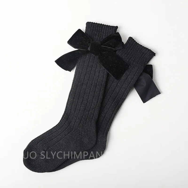 Black Детские гольфы милые однотонные носки до колена для малышей с бантиками, теплые хлопковые носки для девочек, высококачественные носки до колена - Цвет: Black