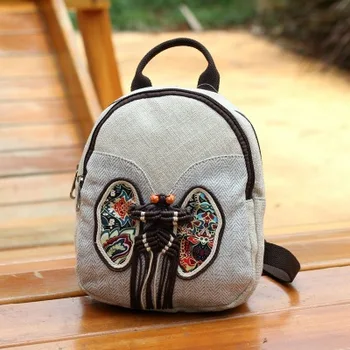 

Fashion national string appliques women shopping backpacks!Nice floral embossing lady small backrack All-match canvas backruck