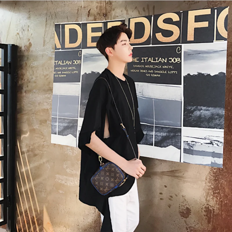 

Men's new fashion Korean version of the hem hole hollowed loose large size black and white two color short sleeve T-shirt