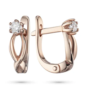 

Earrings in red gold with a diamond