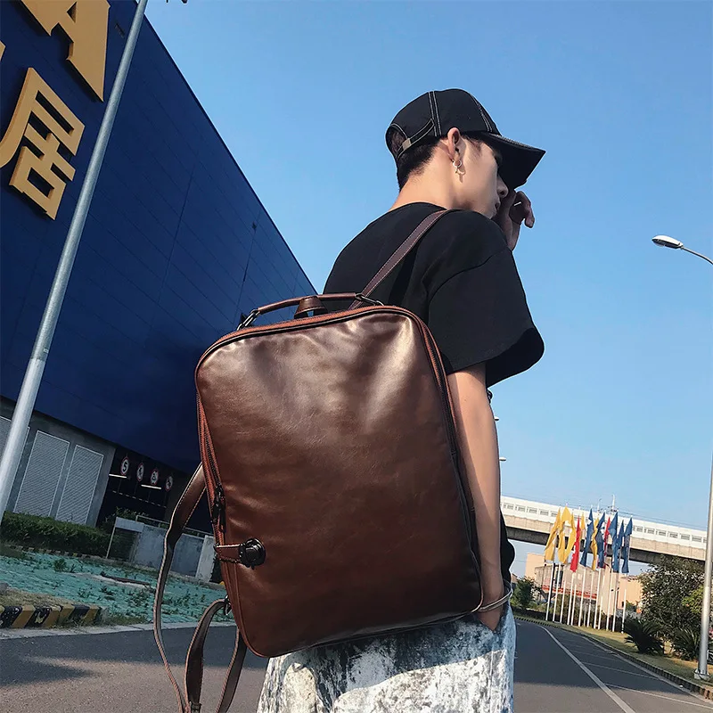 

Trend leather lock head double shoulder bag computer bag men's file computer backpack