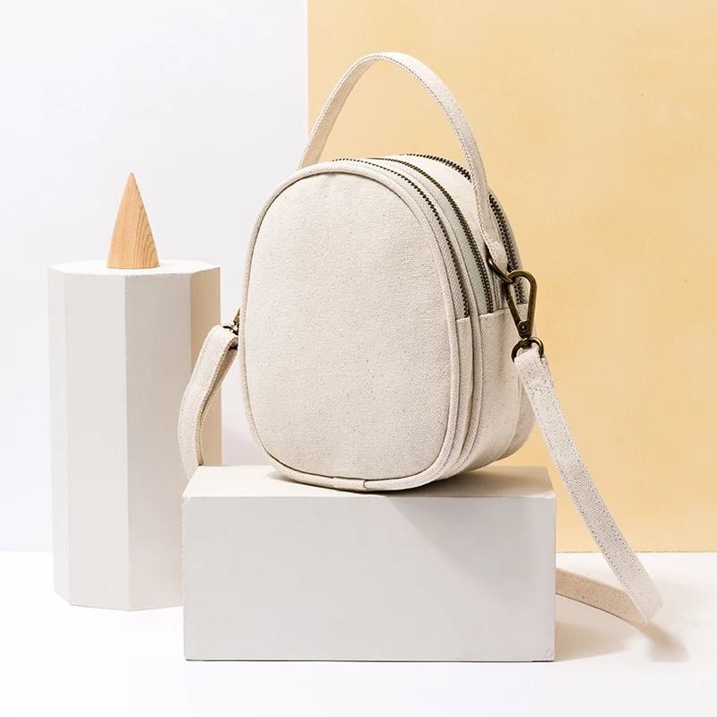 

Shangxin canvas portable small round bag art small fresh fairy fashion wild messenger bag bag