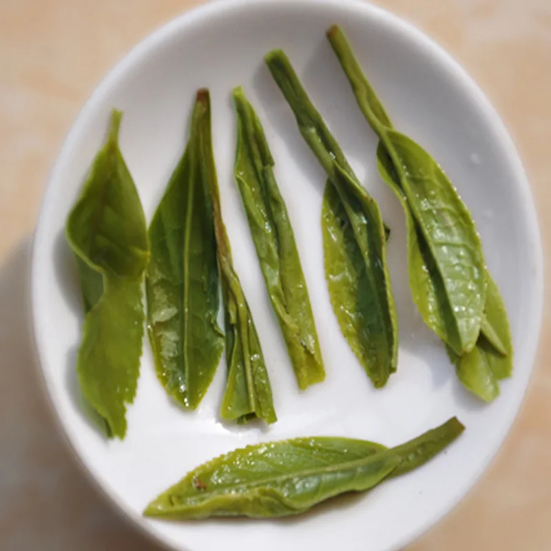 Китайский чай Longjing, китайский зеленый чай Longjing, китайская зеленая еда, забота о здоровье, похудение, красота, зеленый чай