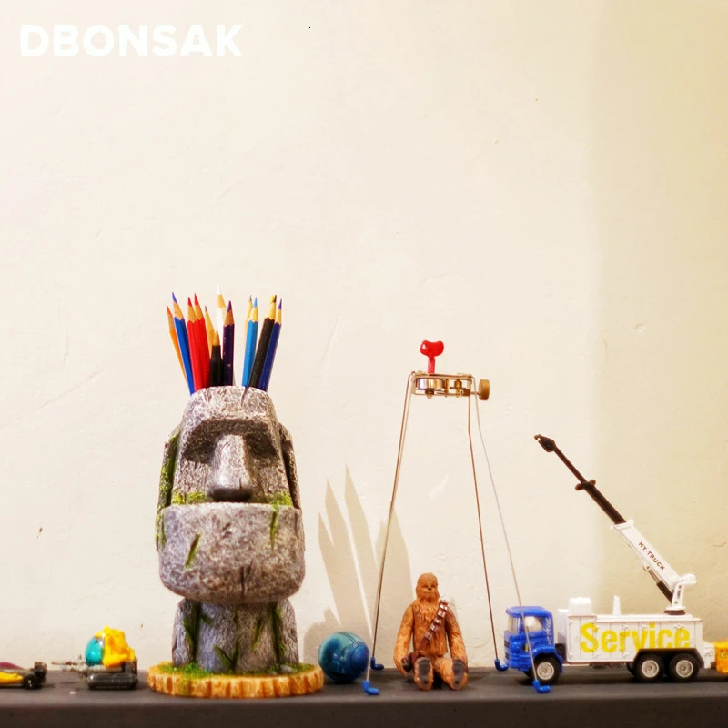 

Portrait Flower Pot Stone Statue Easter Island Festival Moai Pen Holder Pen Holder Storage Box Resin Crafts Decorative Ornaments