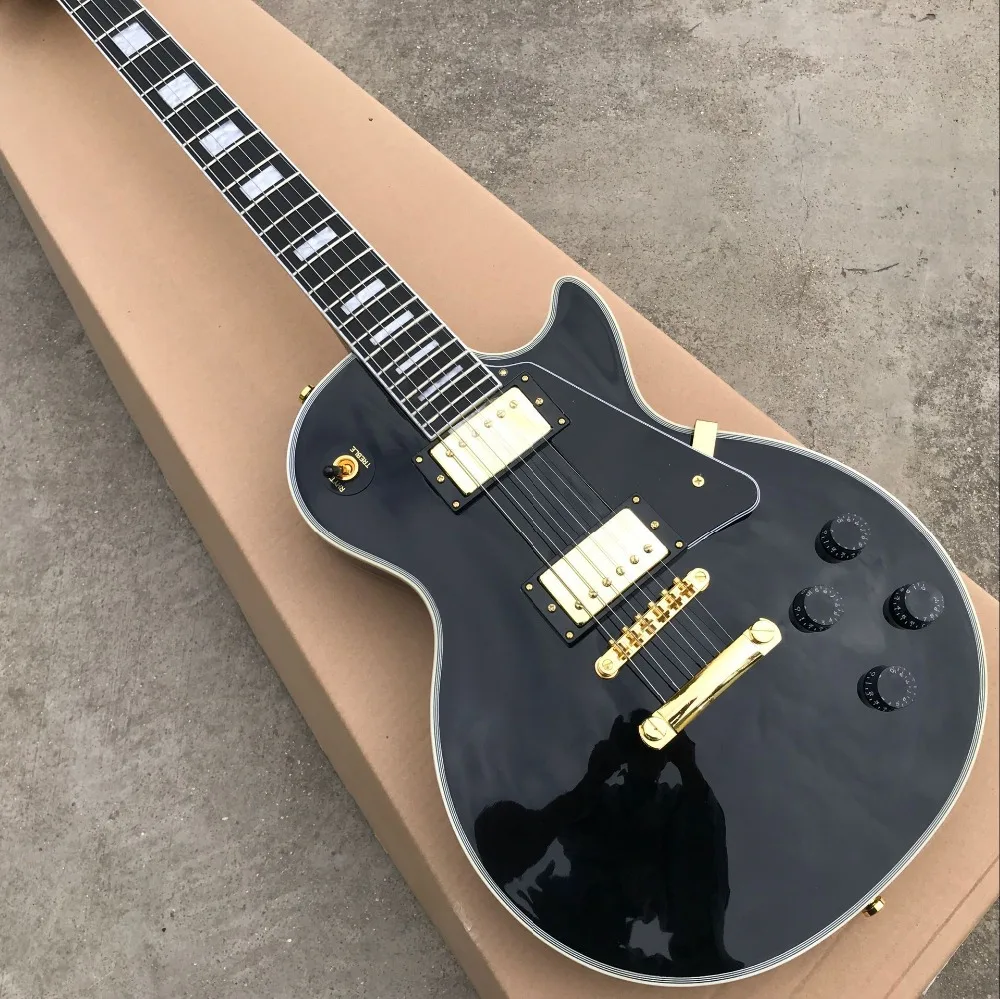 

Top Quality Custom Electric Guitar.Black Color.EBONY Fretboard Binding frets.Golden Hardware.real photos