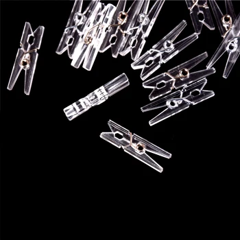 

20PCS/lot 25m Mini Spring Transparent Clips Clothes Photo Paper Peg Pin Clothespin Craft Clips Home Decoration