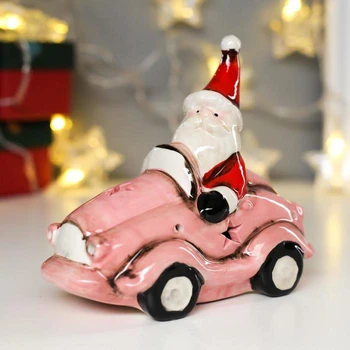 

Souvenir ceramics light "Santa Claus in a red dress on a pink car" 13.5x8x14 cm 4886389