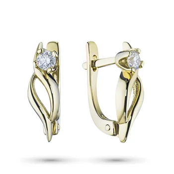 

Earrings in yellow gold with a diamond
