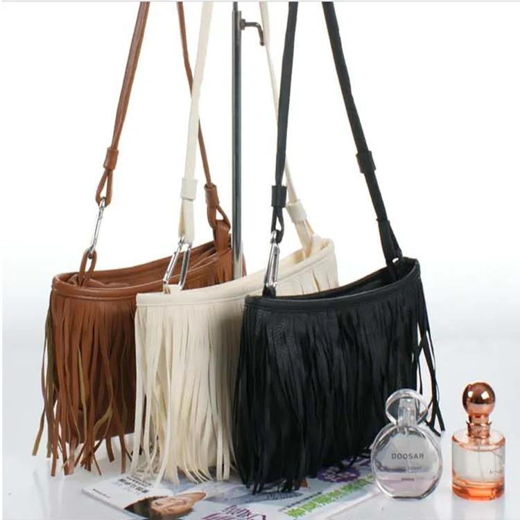 

2020 new women's bag PU leather hand shoulder bag female fashion small tassel diagonal bag casual female bag student bag