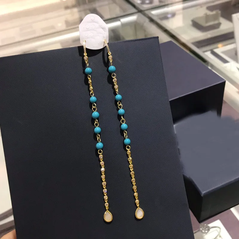 

UMGODLY Luxury Brand Yellow Gold Color Stones Beads Long Leaves Earrings Micro Pave Zirconia Stones Fashion Jewelry
