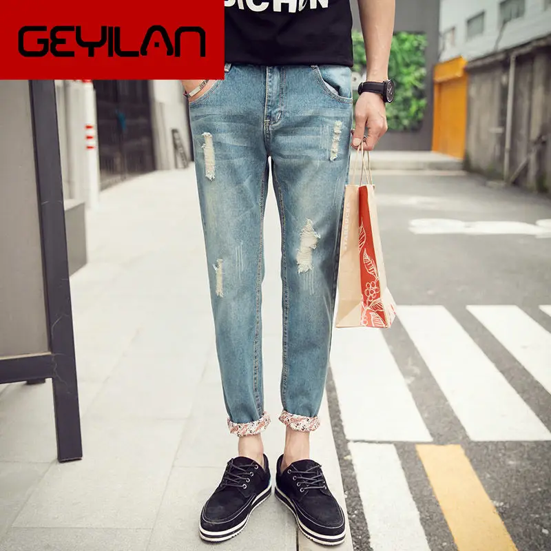

Men's jeans with holes Korean version of self-cultivation young people's trousers leisure nine-minute trousers loose straight