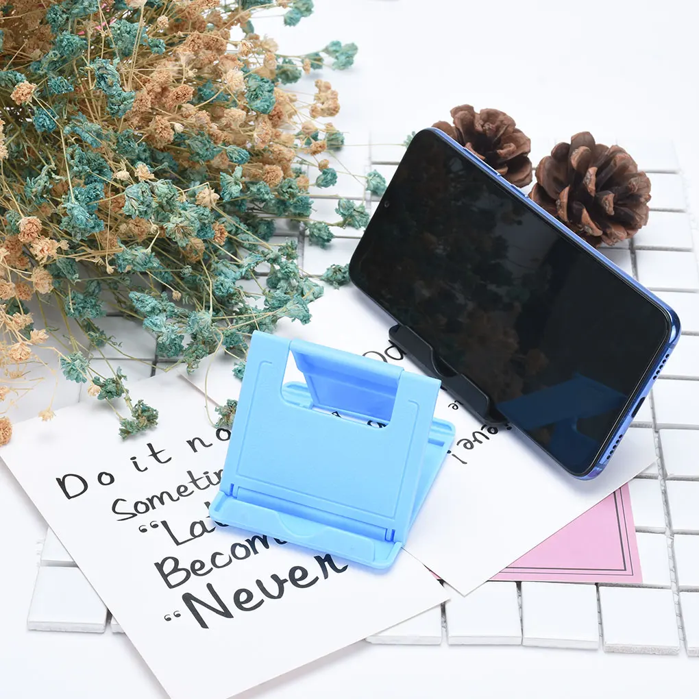 

Gran oferta multiángulo ajustable teléfono portátil soporte perezoso soporte Universal plegable Tablet soporte de escritorio