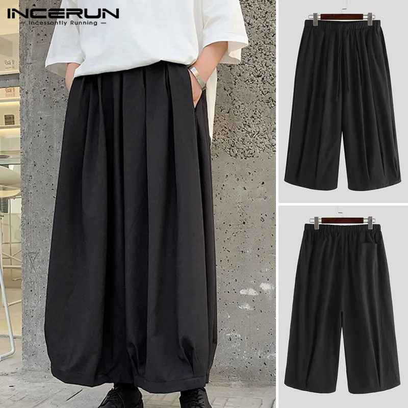 

INCERUN 2020 Men's Wide Leg Pants Solid Color Elastic Waist Pockets Streetwear Trousers Joggers Dance Mens Loose Pants Harajuku