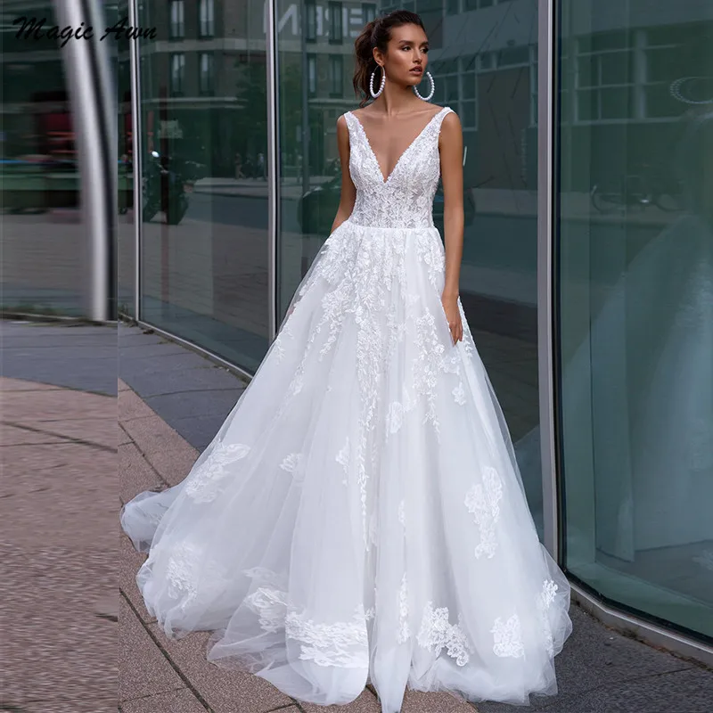 

Magic Awn Elegant Lace Tulle Wedding Dresses Beach Appliques V-Neck Backless Illusion Country A-Line Boho Princess Wedding Gown